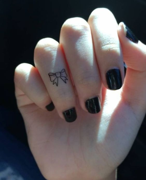 cute finger tattoos