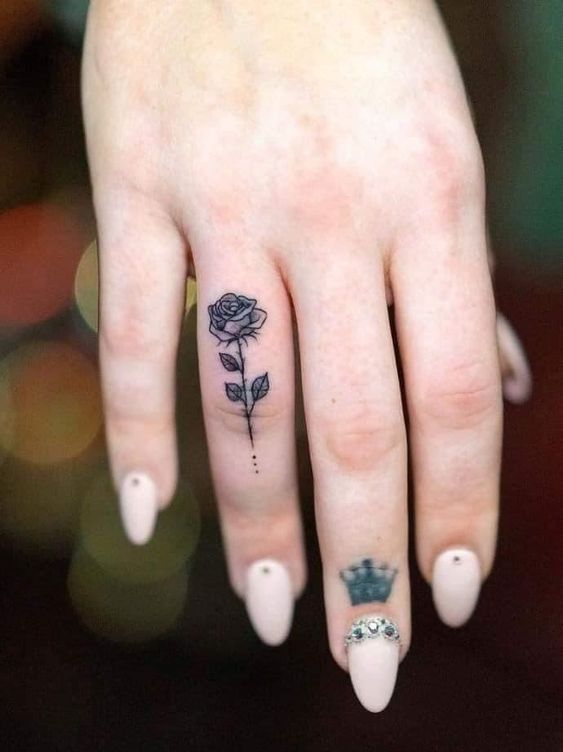 ring finger tattoo