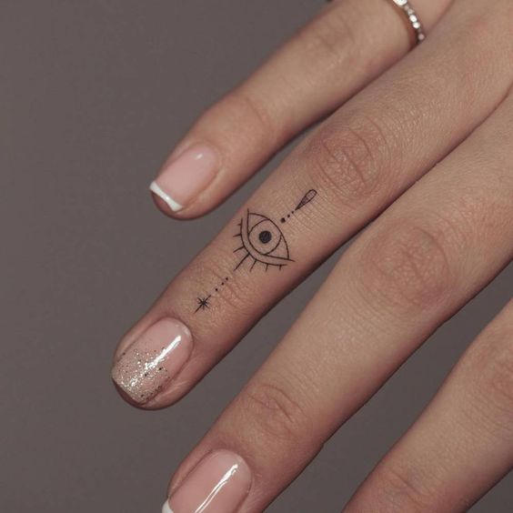 simple finger tattoo