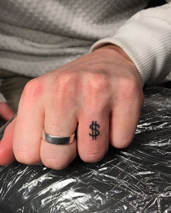 symbol tattoos for finger
