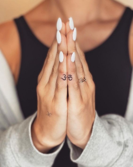 traditional finger tattoo