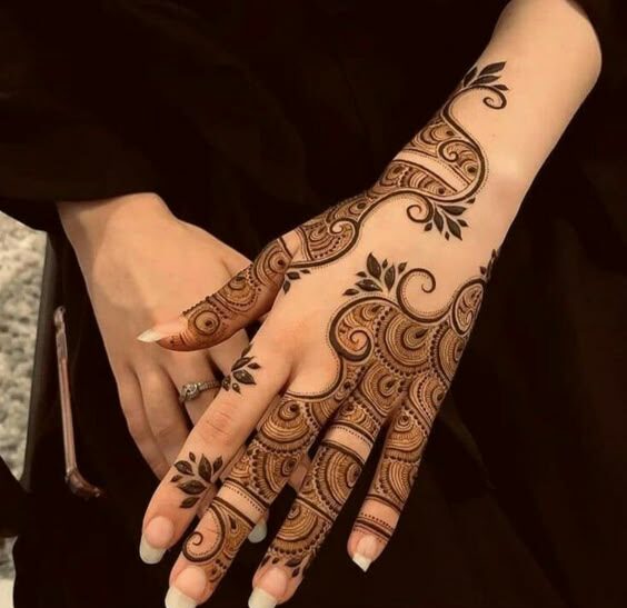 Unique back hand mehndi design simple