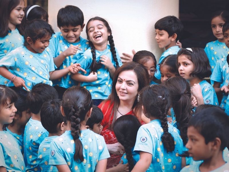 nita ambani with underpriviledged children