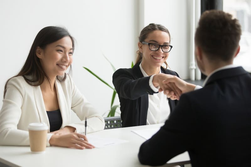 Lawyer client shaking hand