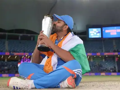 rohit-sharma with the Champions Trophy