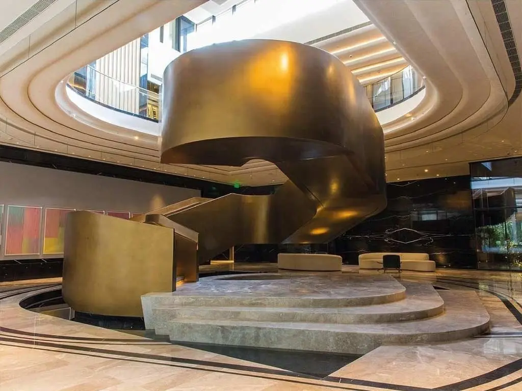Bronze staircase of DLF Camellias