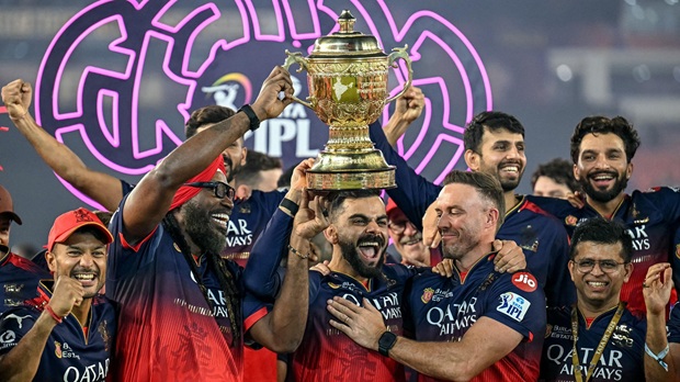 RCB with IPL 2025 trophy