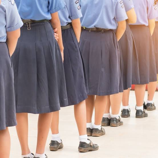 girls in school uniforms long skirts