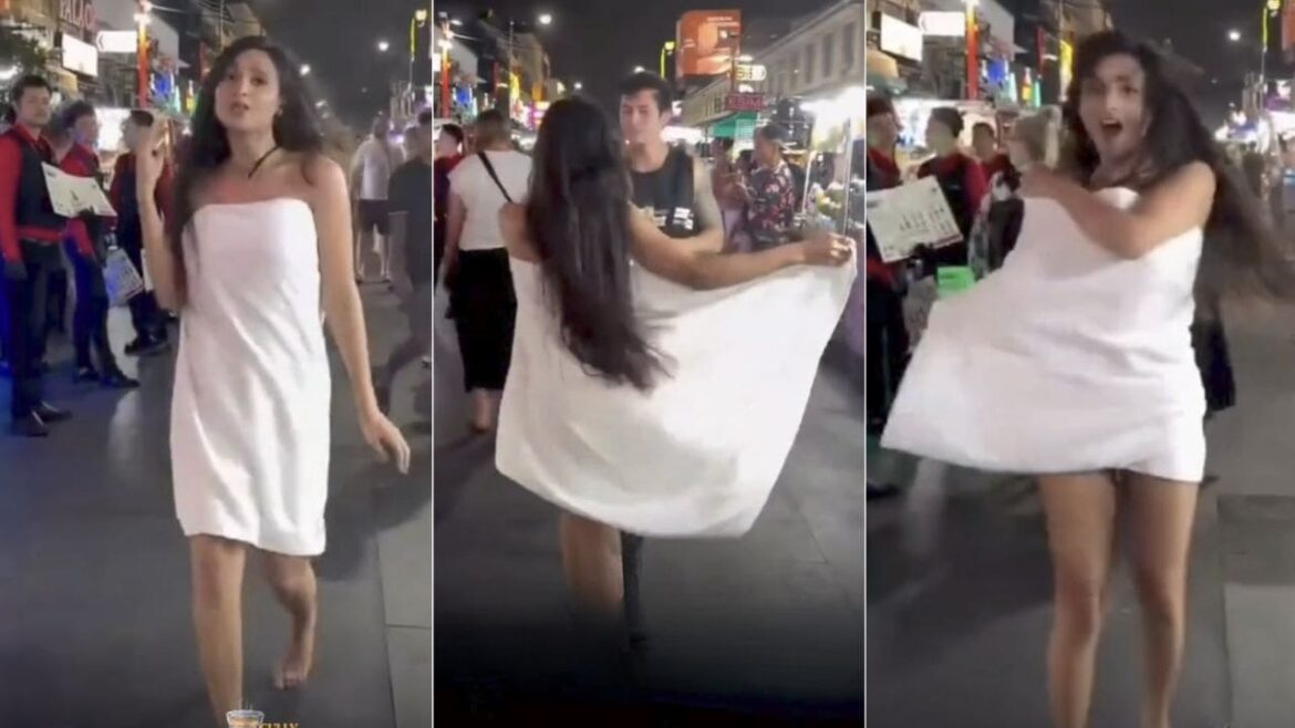 Indian Woman Tourist Seen Dancing In A Towel On Foreign Streets